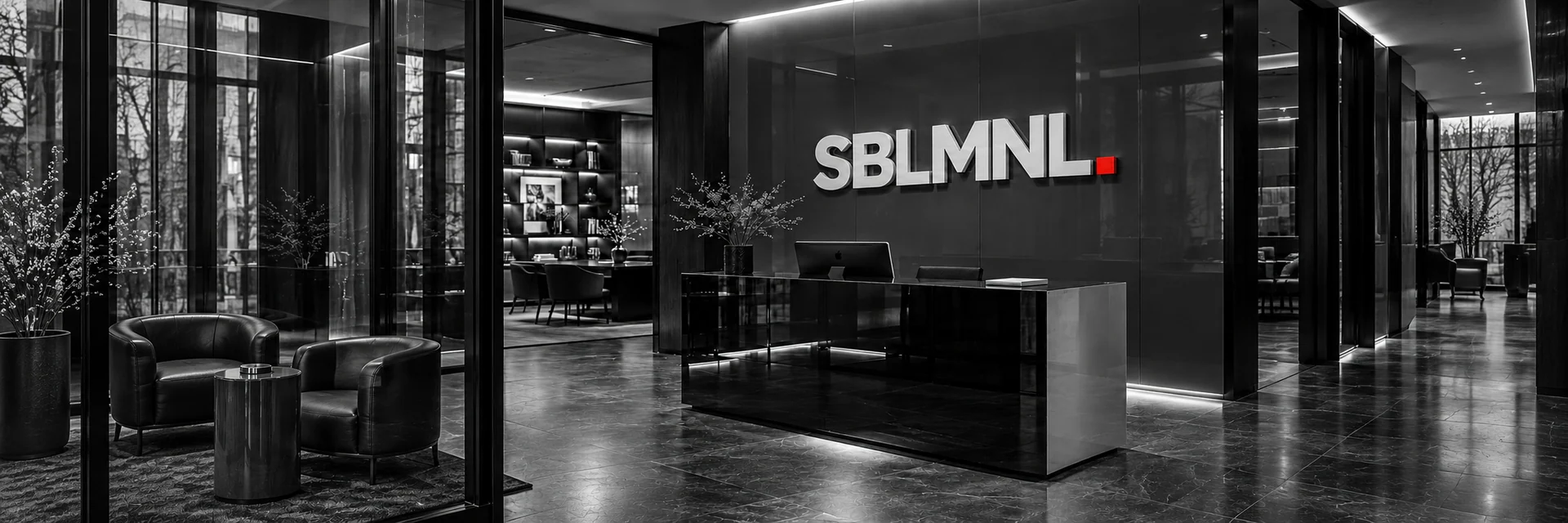 A black-and-white conceptual SBLMNL reception with a red wordmark period.
